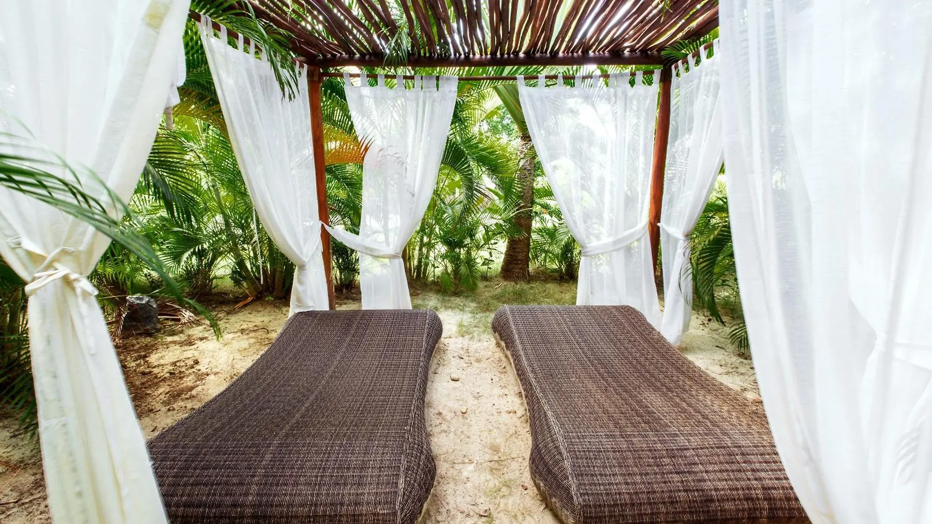 Отель Grand Caribe Suites Deluxe Пунта-Кана